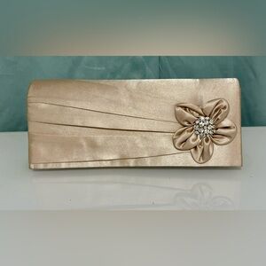 Elegant Cream Clutch with Floral Accent